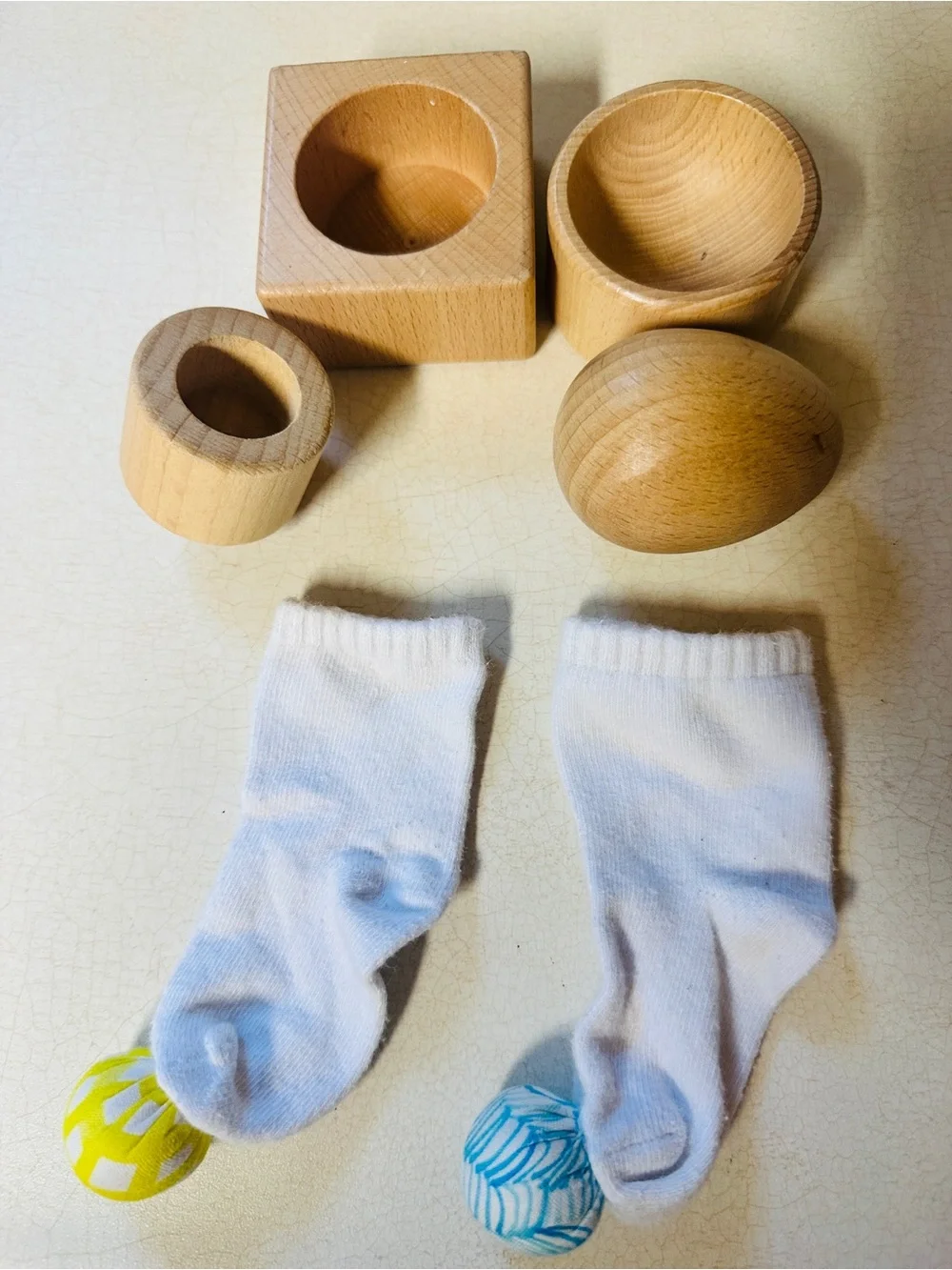 Lovevery White rattle Play Socks, Egg Cup, and Pincer Puzzle Bundle